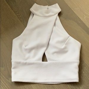 White crop top with crossed front and open back